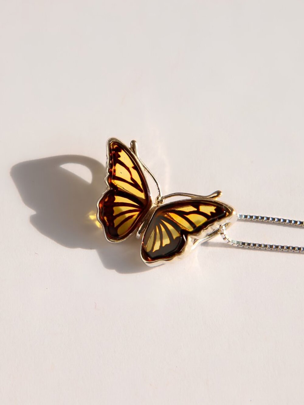 Baltic Amber Butterfly Necklace in Sterling Silver